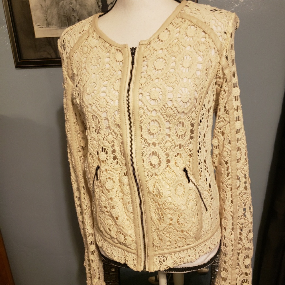 Beige colored crochet style zip up cardigan!